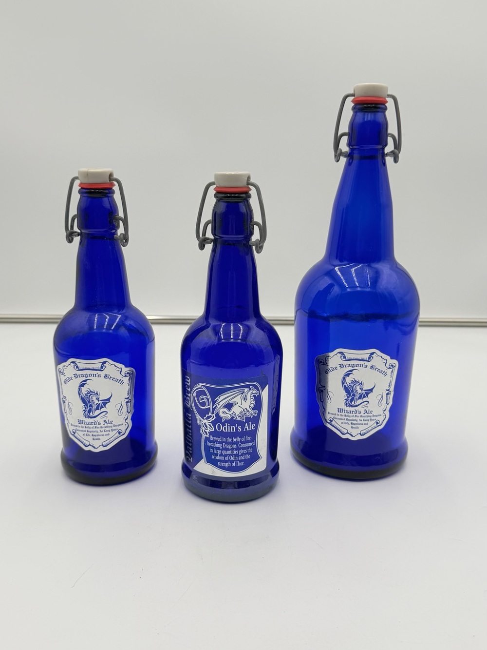 Olde Dragon’s Breath Odin Ale Cobalt Blue Glass Bottle Set Fantasy